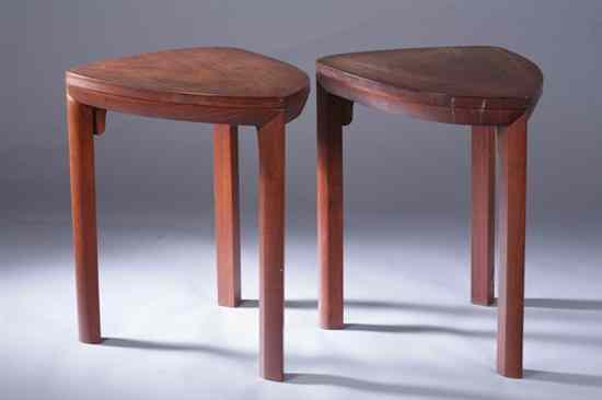 Appraisal: PAIR MODERN ROSEWOOD OCCASIONAL TABLES Possibly huanghuali wood Heavy geometic