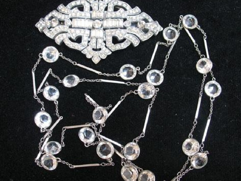 Appraisal: AN ART DECO DOUBLE CLIP CLEAR PASTE BROOCH with additional