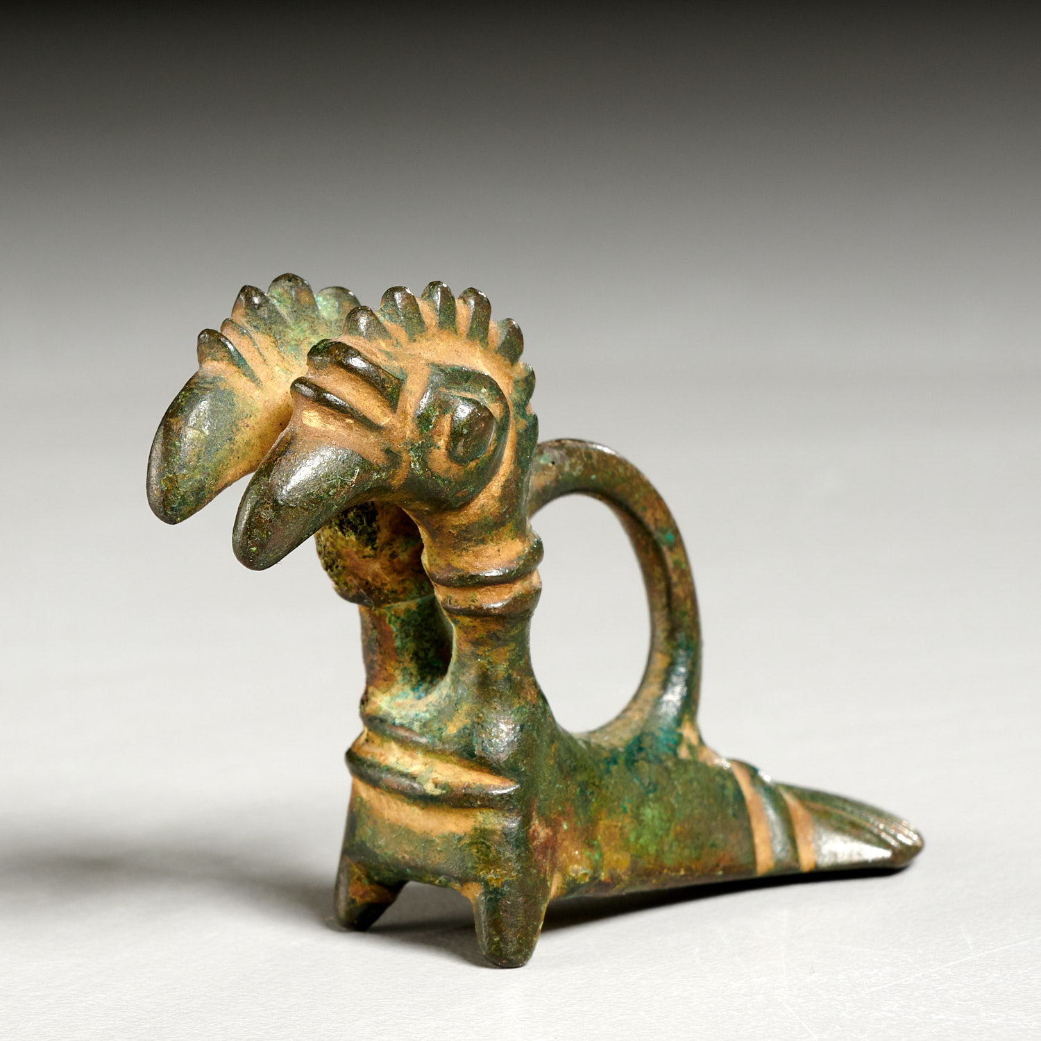 Appraisal: ANCIENT LURISTAN ANIMAL FIGURAL BRONZE th- th c BCE Western