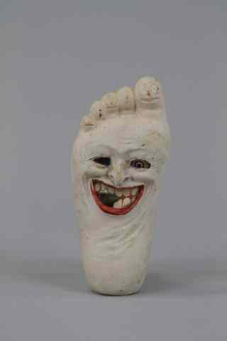 Appraisal: FOOT FIGURAL HALLOWEEN LANTERN Painted composition incredible visual effects paper