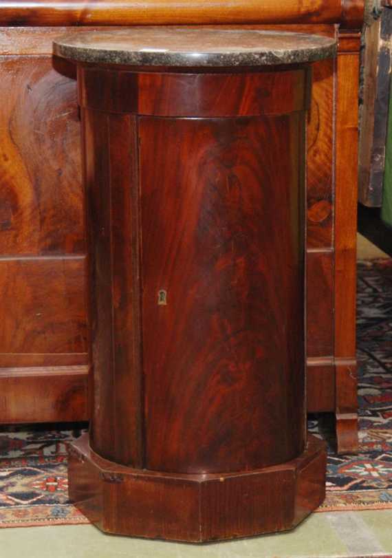 Appraisal: MAHOGANY COLUMN GUERIDON Biedermeier German circa With a grey black