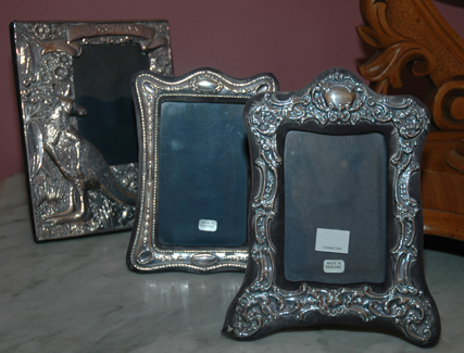 Appraisal: THREE STERLING SILVER PICTURE FRAMES