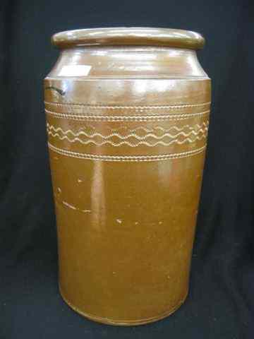 Appraisal: Stoneware Crock embossed designs brown slip glaze '' tall