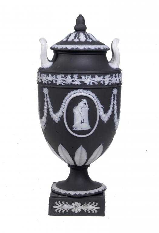 Appraisal: A WEDGWOOD SOLID BLACK JASPER WARE VASE AND COVER ornamented