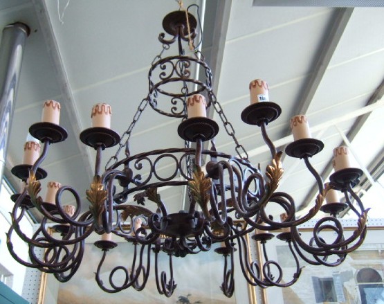 Appraisal: An eighteen light bronzed wrought iron chandelier from Christopher Wray