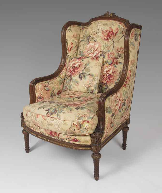 Appraisal: TH CENTURY FRENCH CARVED WING CHAIR Carved and accented gilt