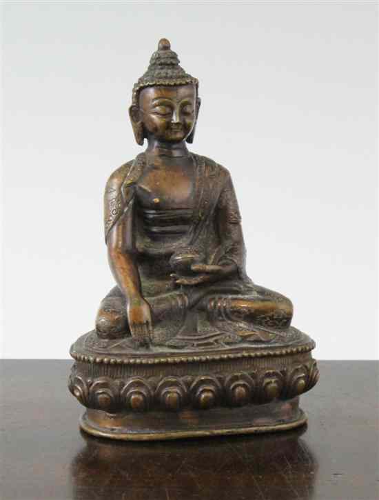 Appraisal: A Sino-Tibetan bronze seated figure of Buddha th century holding