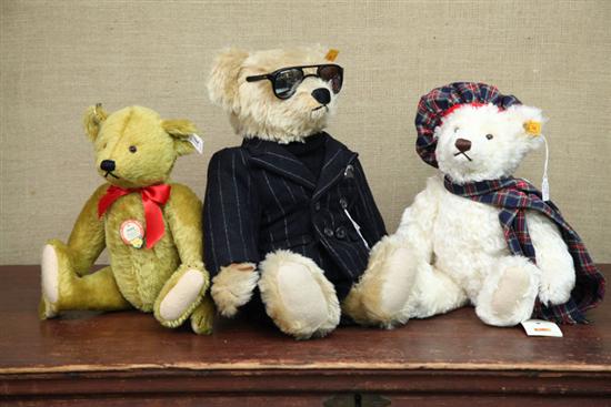 Appraisal: THREE STEIFF BEARS ''Petsy'' replica ''h One with hat scarf