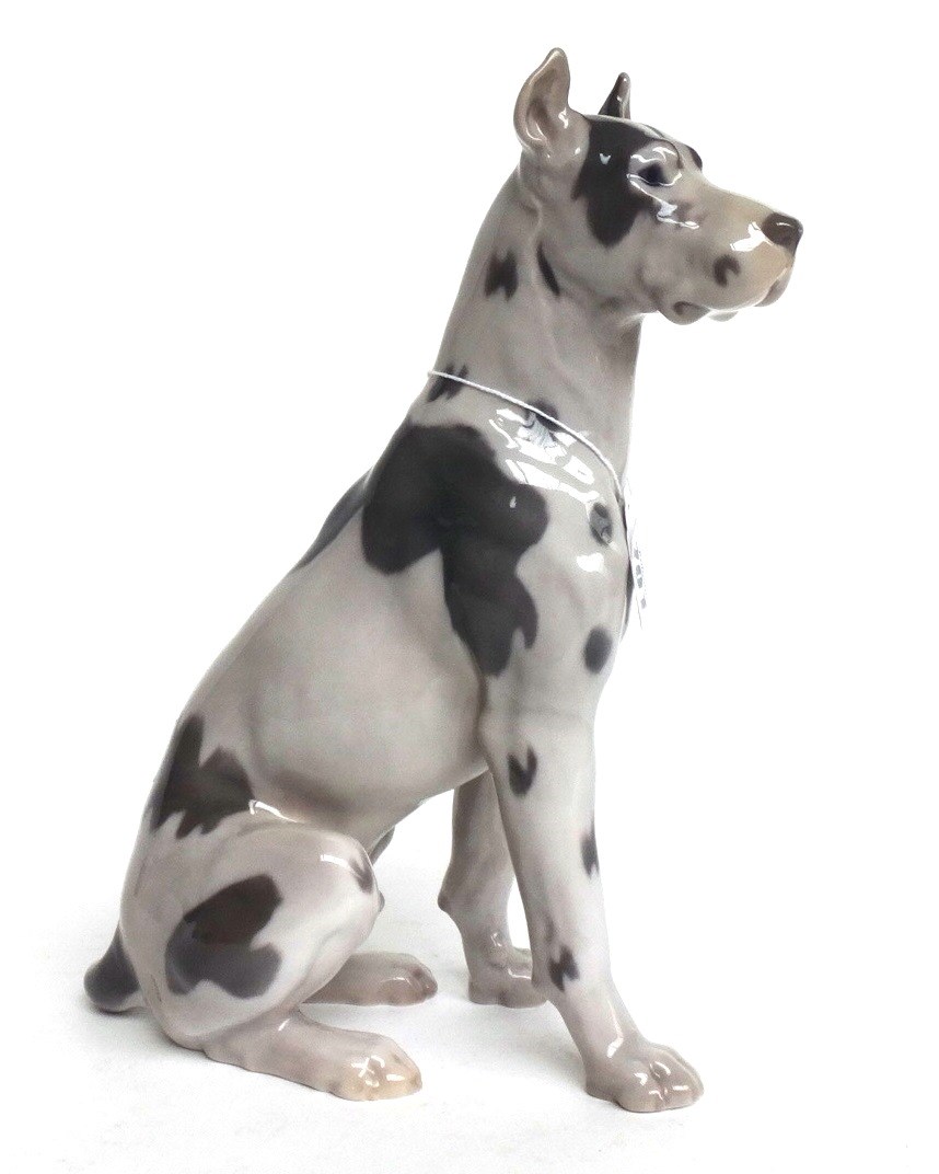 Appraisal: A Bing and Grondahl model of a seated Great Dane