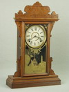 Appraisal: SHELF CLOCK - Circa walnut cased gingerbread style shelf clock