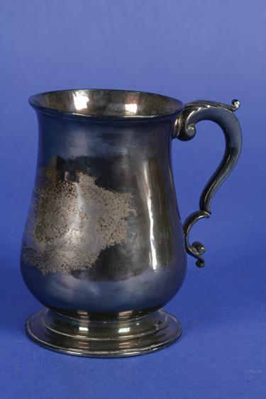 Appraisal: A GEORGE III MUG of baluster form with a leaf