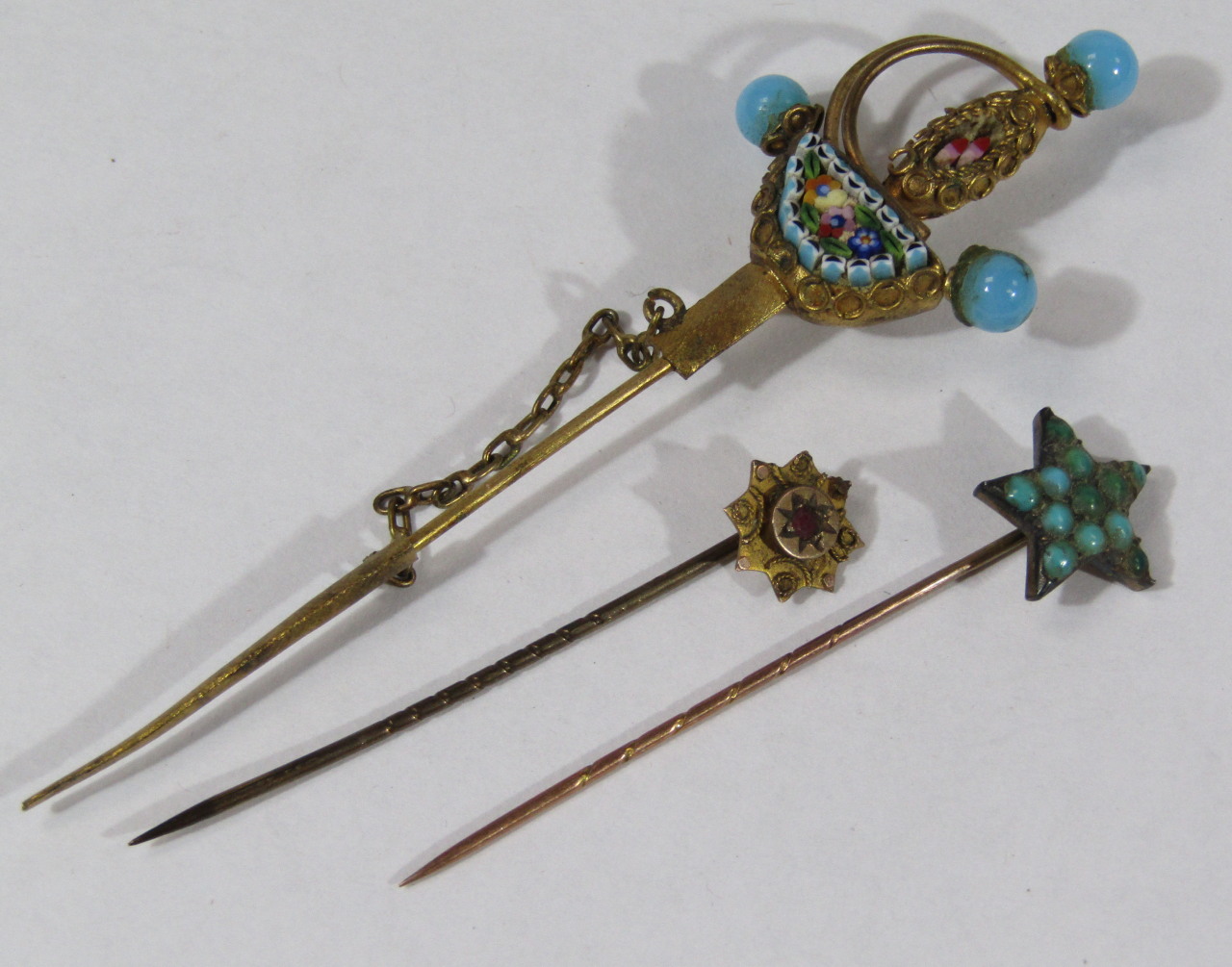 Appraisal: A micro mosaic set sabre brooch tother with two stick