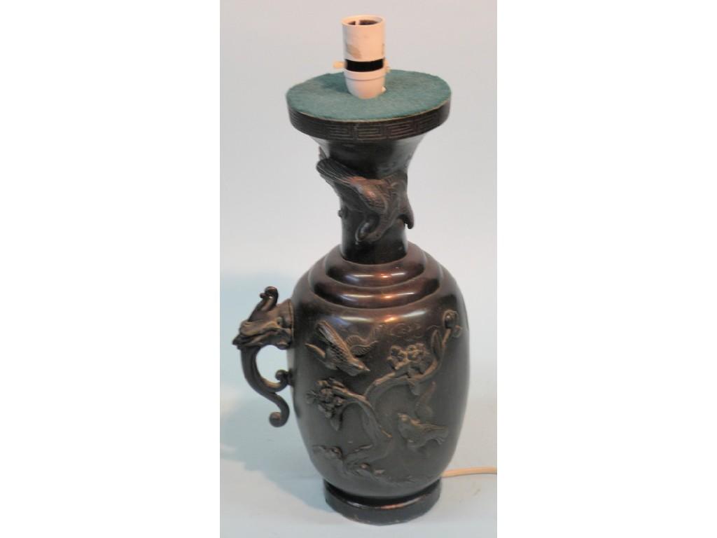 Appraisal: A Chinese bronze two handled vase cast with birdsProvenance Barbara