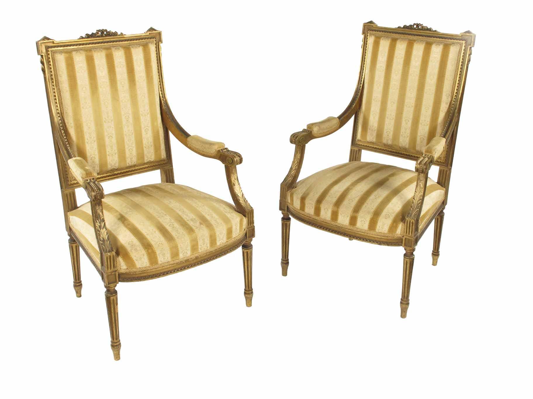 Appraisal: A pair of Louis XVI style giltwood fauteuil