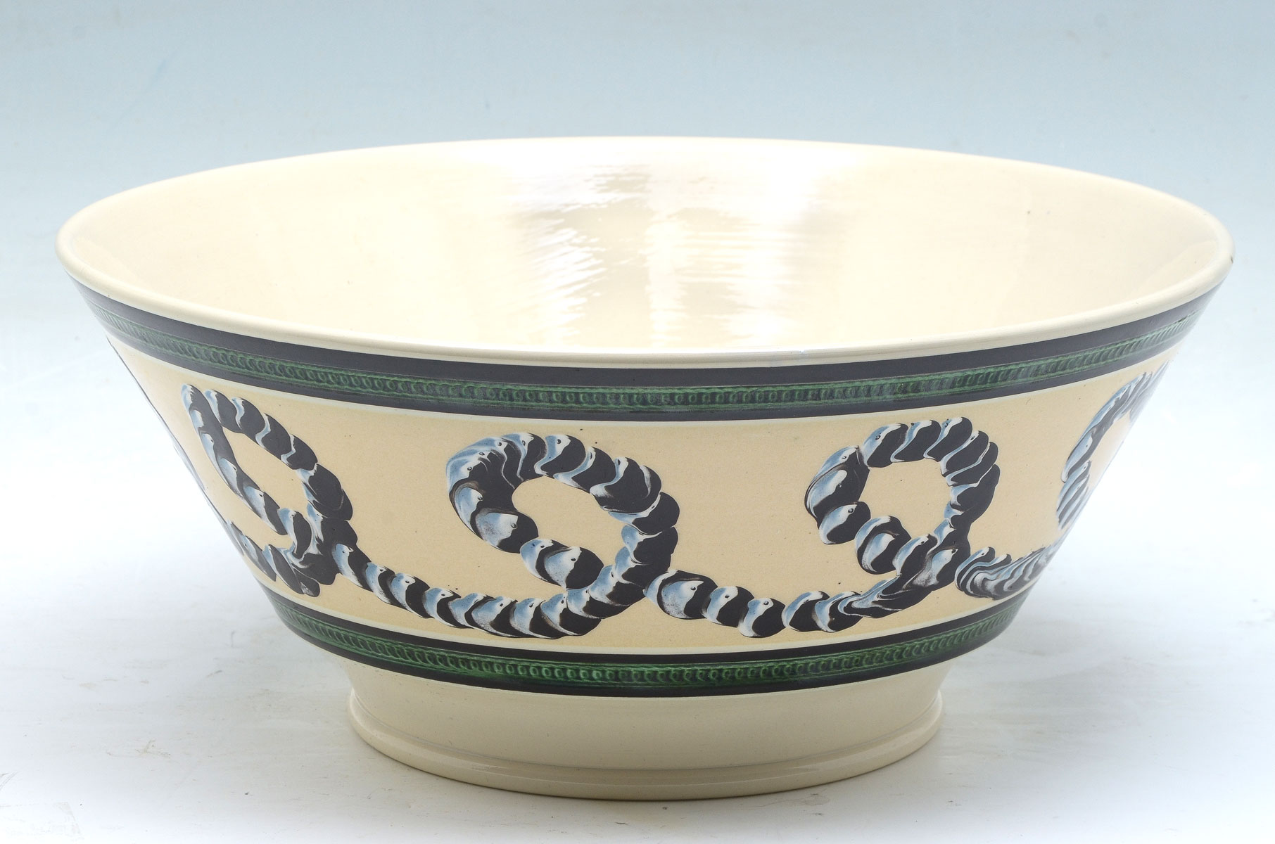 Appraisal: DON CARPENTIER LARGE MOCHAWARE BOWL Earthworm encompassing design Impressed marks