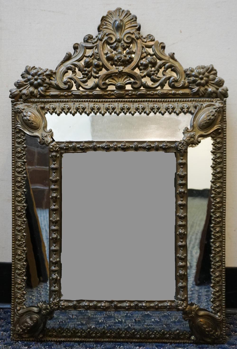 Appraisal: Baroque Style Repousse Brass Mounted Bevel Mirror x in x