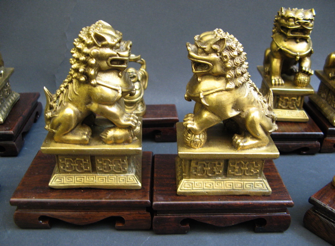 Appraisal: COLLECTION OF GILT BRONZE BRASS ASIAN FIGURES and Rosewood plinths