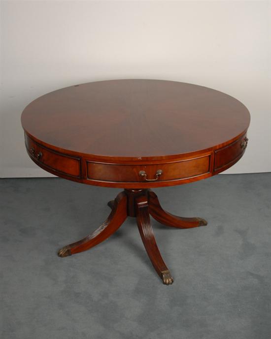 Appraisal: A Mahogany Duncan Phyfe-style Drum Center or Breakfast Table with