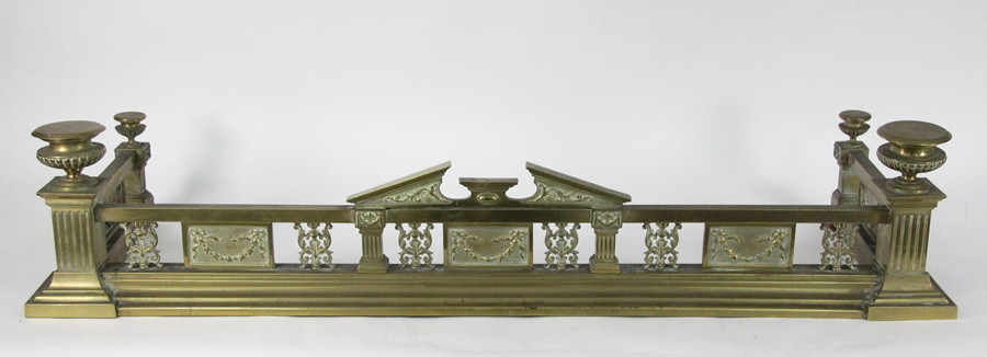 Appraisal: A rectangular brass fender of classical design with reeded vase