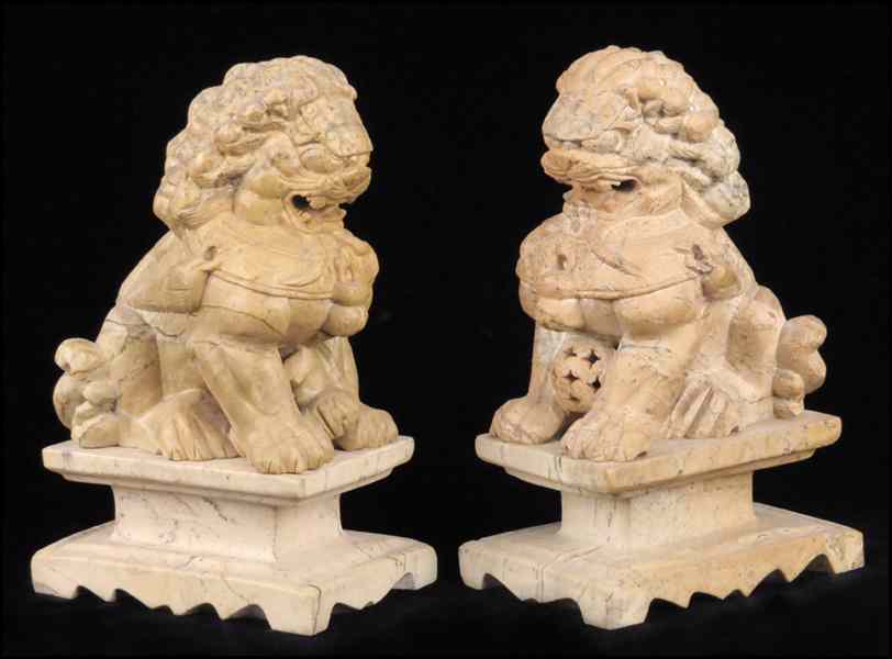 Appraisal: PAIR OF CARVED STONE FOO DOGS '' tall Condition No