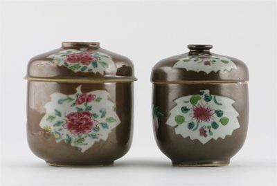 Appraisal: Two Chinese famille rose caf -au-lait ground jars and covers