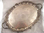 Appraisal: An impressive early Victorian silver two handled tray flat chased