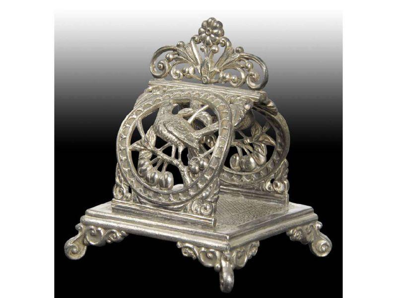 Appraisal: Birds Arch Openwork Figural Napkin Ring Description Footed square base