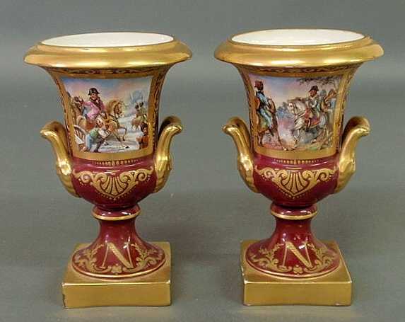 Appraisal: Pair of Paris porcelain urns maroon and gilt with painted