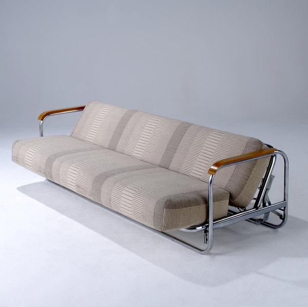 Appraisal: STYLE OF ALVAR ALTO Convertible sofa bed with wool cushions