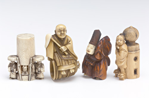 Appraisal: JAPANESE NETSUKE Four carved and stained ivory and wood netsuke