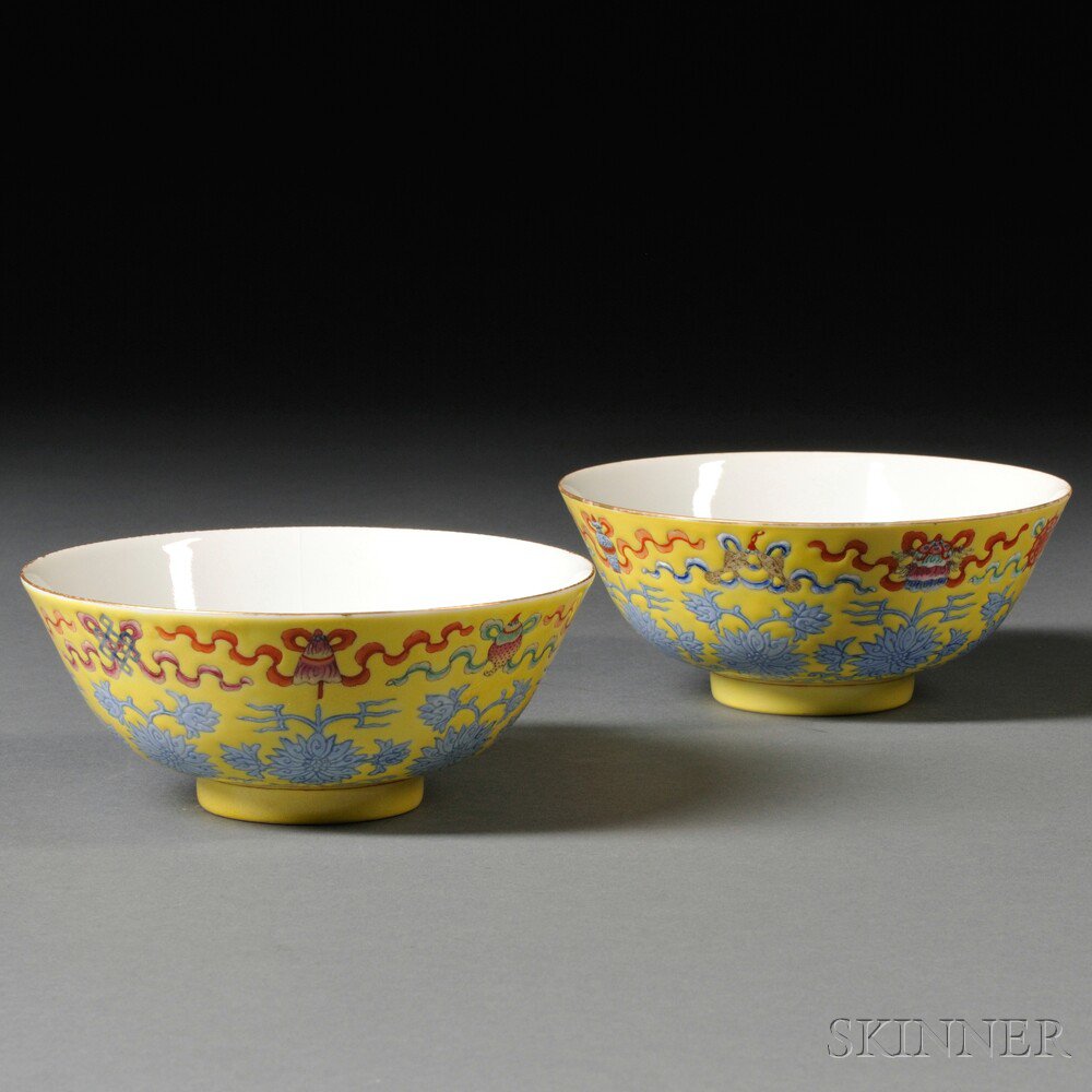 Appraisal: Pair of Yellow-ground Porcelain Bowls China the exterior decorated with