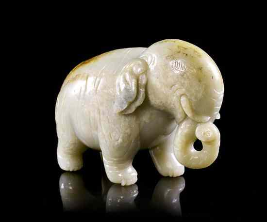 Appraisal: A Jade Carving of an Elephant of green stone with