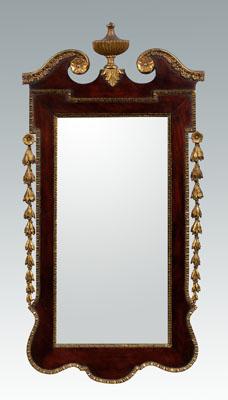 Appraisal: Chippendale style mirror mahogany with urn pediment flanked by scrolls