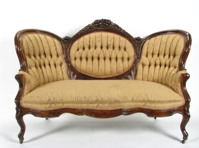 Appraisal: Victorian cameo back settee with rose carvings button tufted and