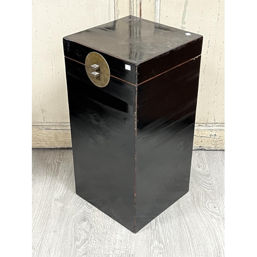 Appraisal: Quality Chinese black lacquer lift top square storage trunk with