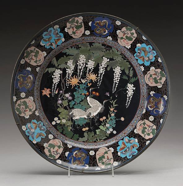 Appraisal: A large cloisonn enameled metal charger Meiji Period With a