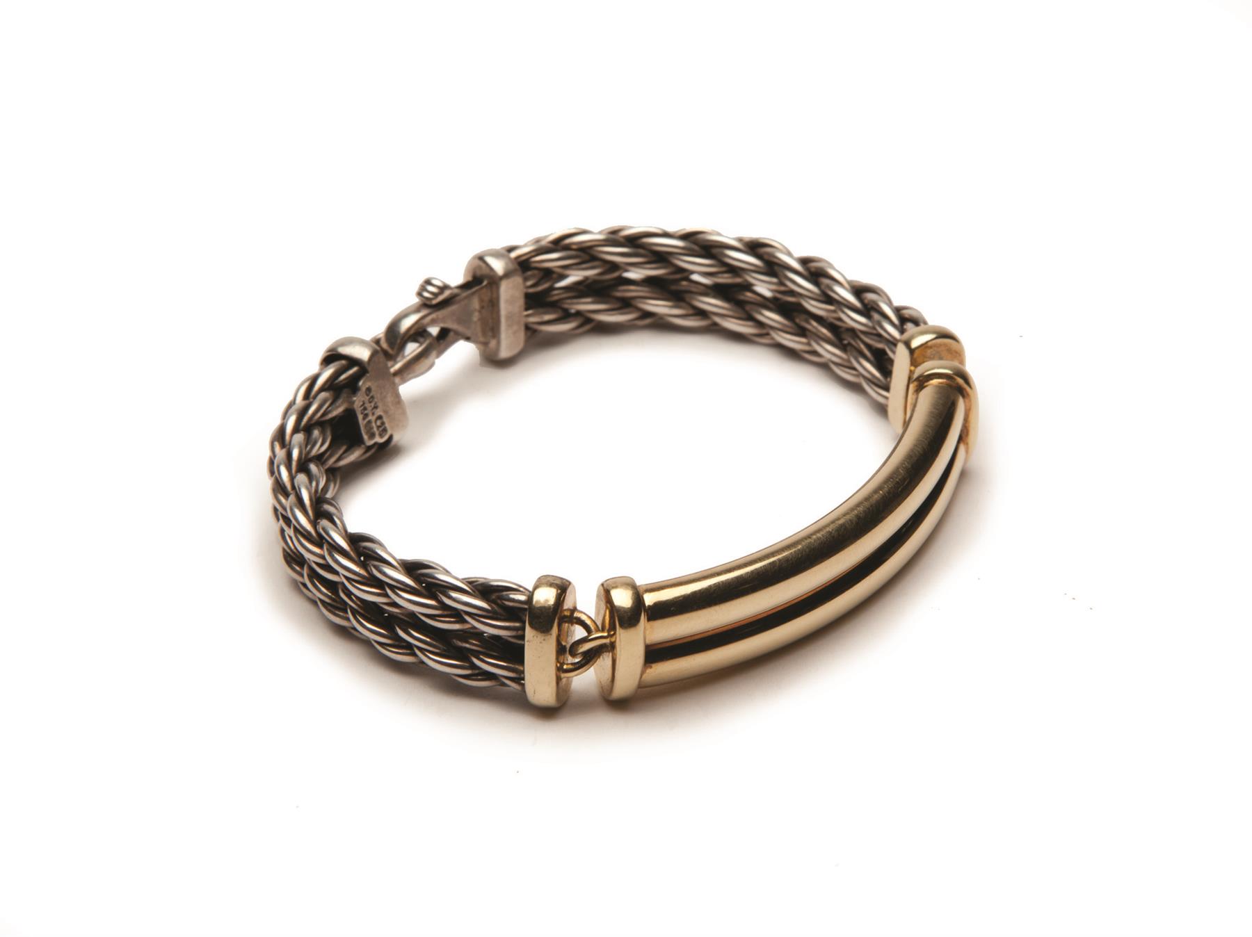 Appraisal: DAVID YURMAN STERLING AND GOLD ID BRACELET Bold design incorporates