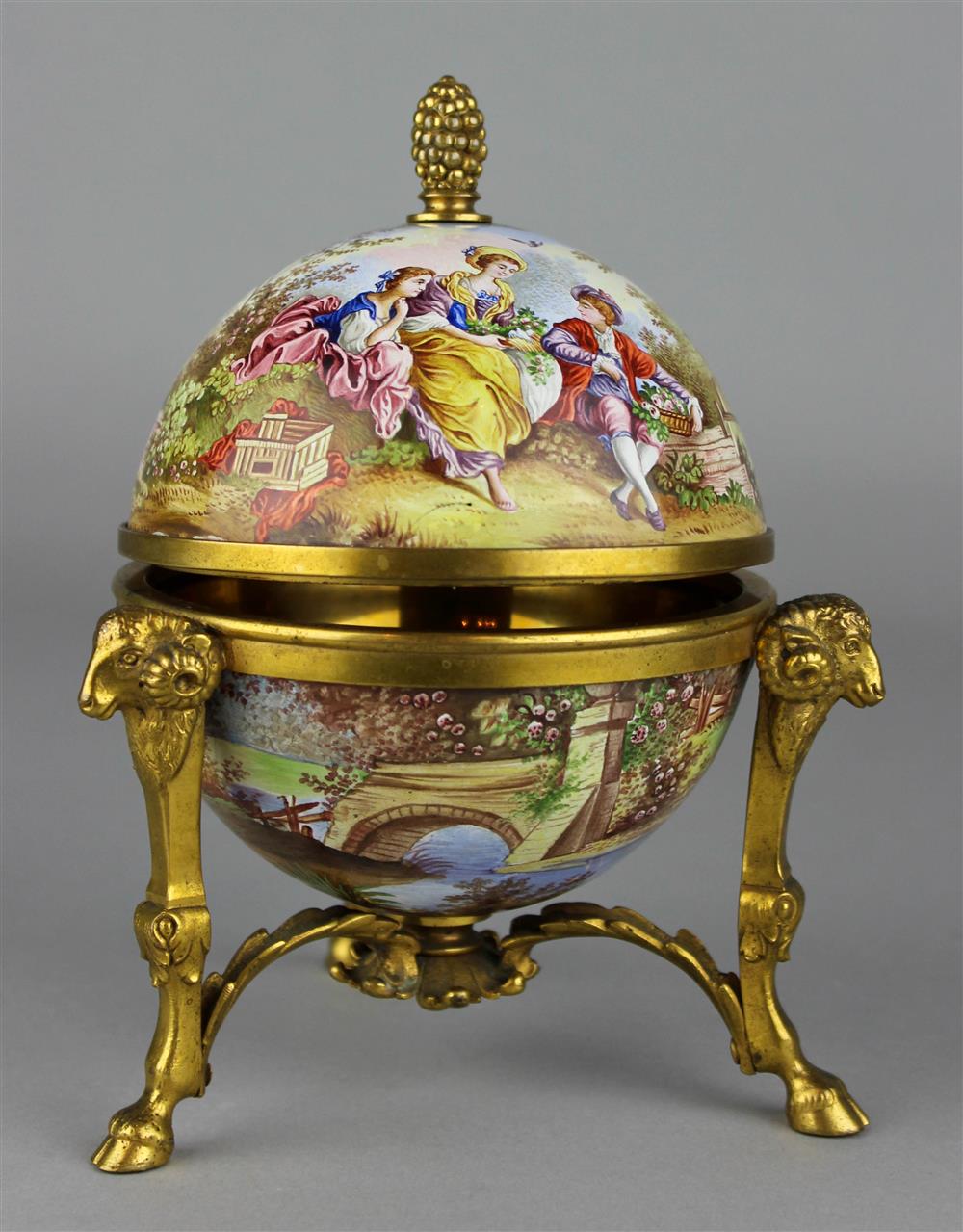 Appraisal: VIENNESE ENAMEL GLOBULAR FOOTED BOX the mount stamped Vienna with