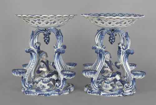 Appraisal: Pair of Delft blue and white figural centerpieces h