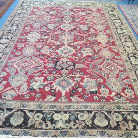 Appraisal: Mahal Persian Handmade Room Size Rug fanciful designs on red