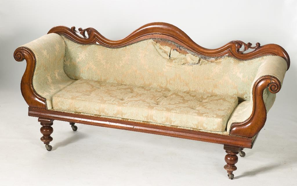 Appraisal: th CENTURY MAHOGANY HUMP-BACK SCROLL-END SOFA the crest rail with