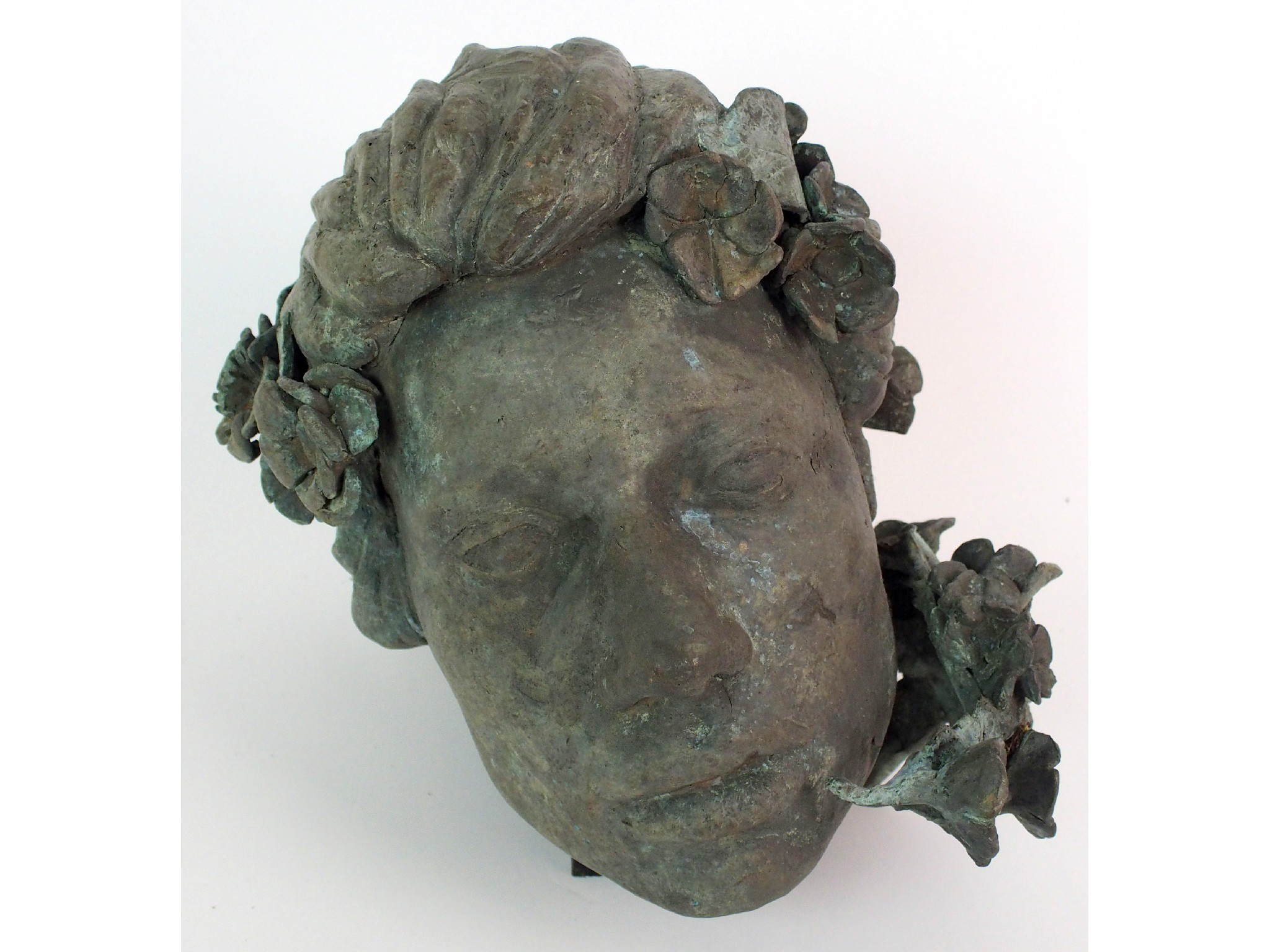 Appraisal: Edgar 'Floral head' bronze sculpturethe cast bronze female head with