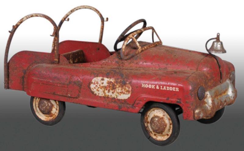 Appraisal: Pressed Steel BMC Fire Truck Pedal Car Description Complete with