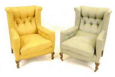 Appraisal: A matched pair of armchairs each with a button back