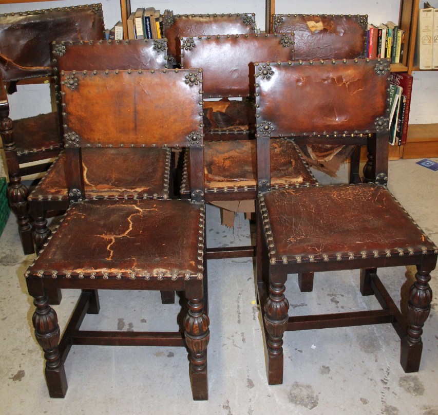 Appraisal: A set of seven Carolean style oak and leather dining