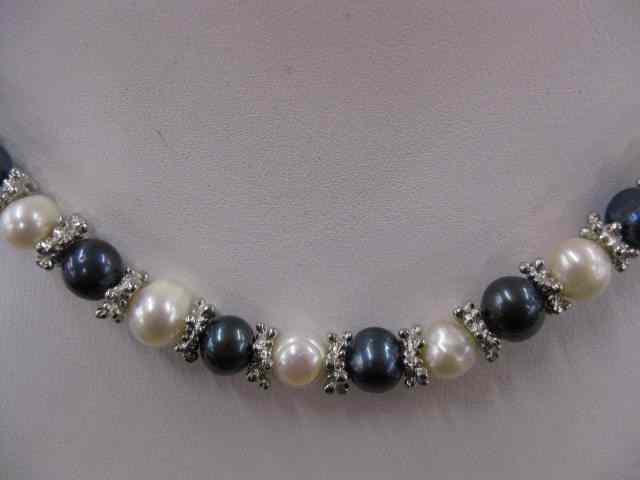 Appraisal: Pearl Necklace alternating white black mm pearls '' long