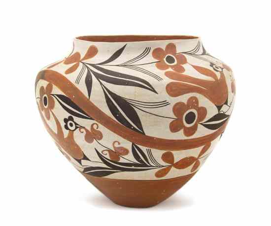 Appraisal: An Acoma Polychrome Olla having bird and floral design signed