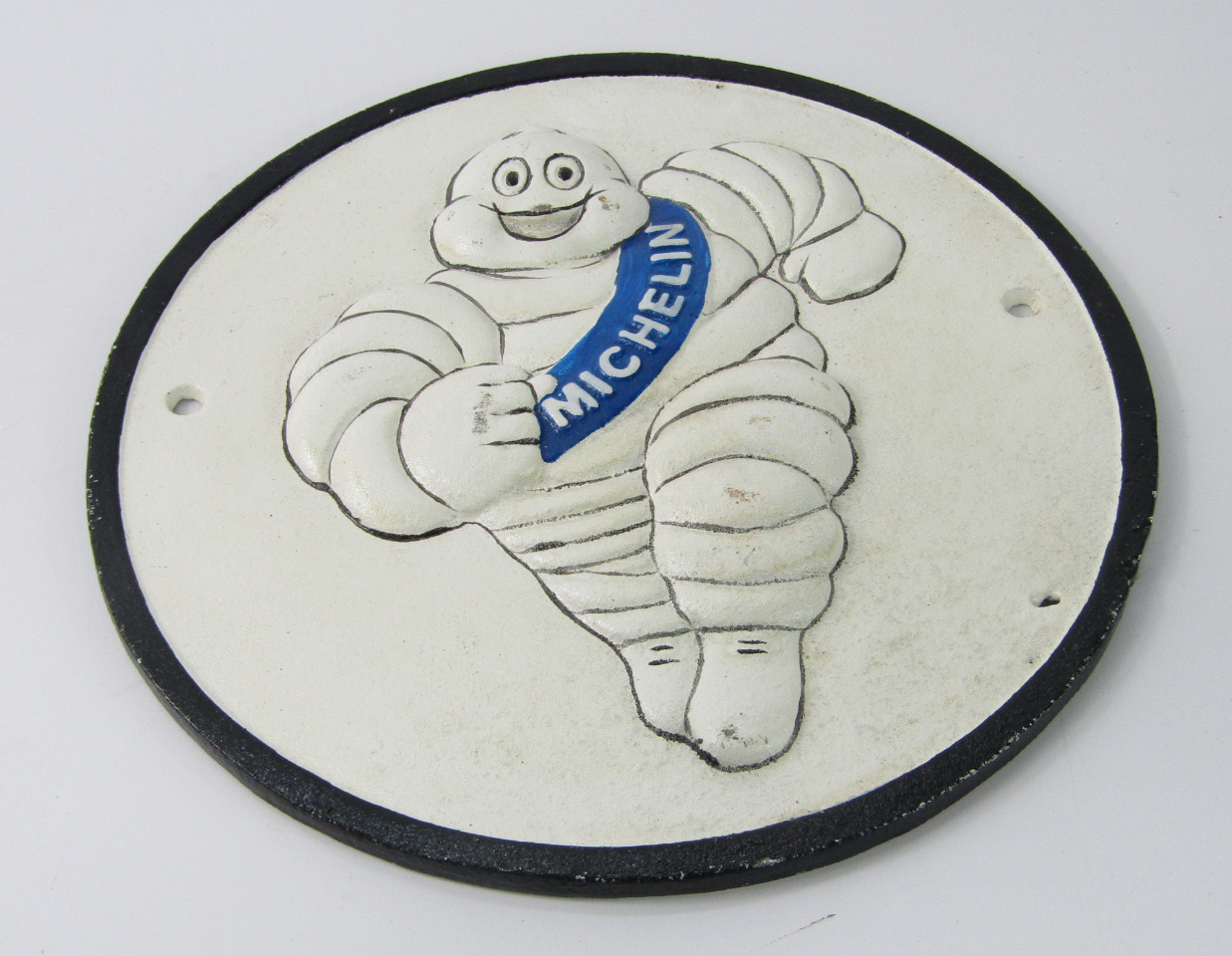 Appraisal: A running Michelin Man sign