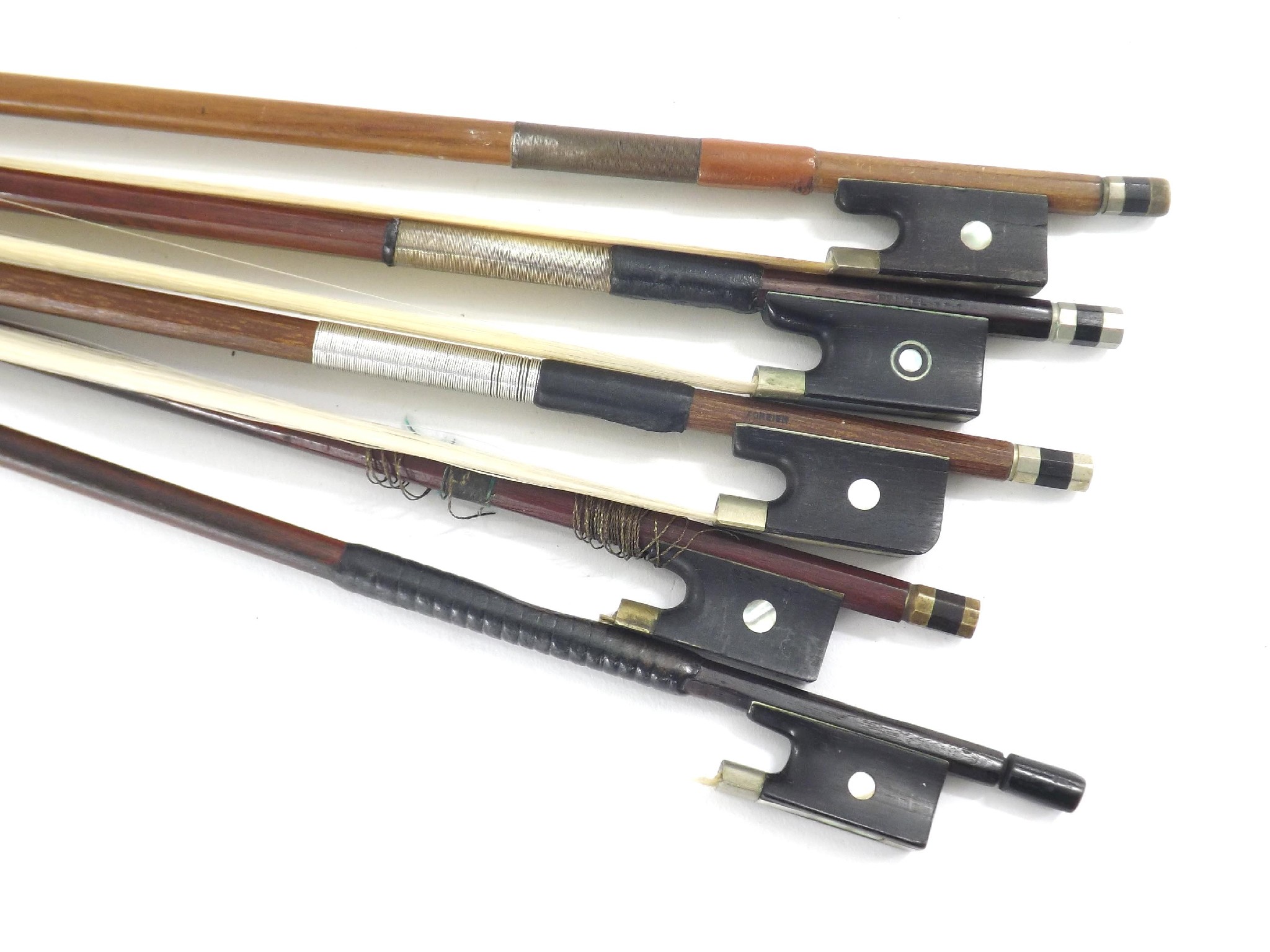 Appraisal: Nickel mounted violin bow stamped Penzel also four other old