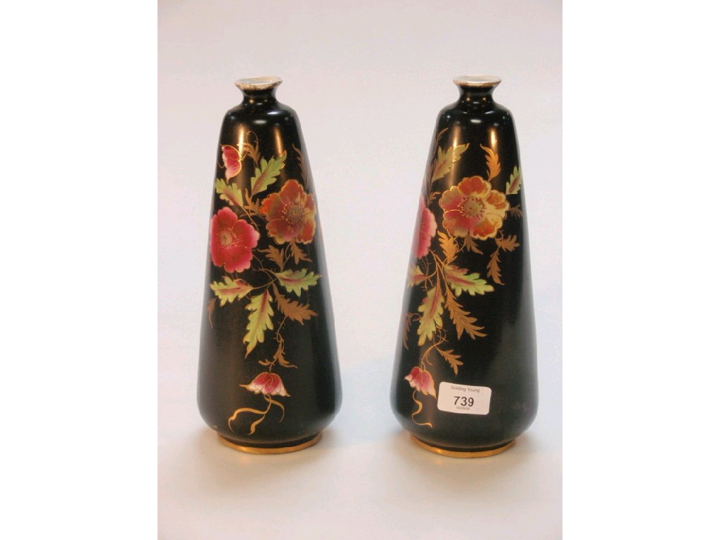 Appraisal: A pair of Falcon ware black ground flower sprigged narrow